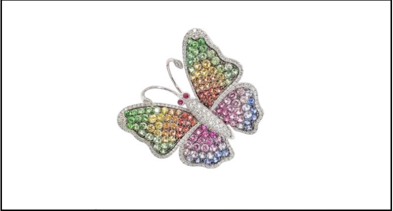 Broche 'Rainbow Butterfly' con diamantes y zafiros de fantasía en oro de 18 quilates, de H & R Jewellery Ltd.